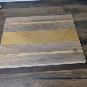 Beech, Iroko and Oak cutting board with chamfered edges, hand-finished with food-safe oil. Front side.